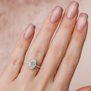 The Pave Aline Set With A 1 Carat Oval Lab Diamond