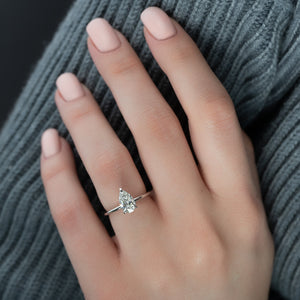 The Kamellie Set With A 4.5 Carat Pear Moissanite