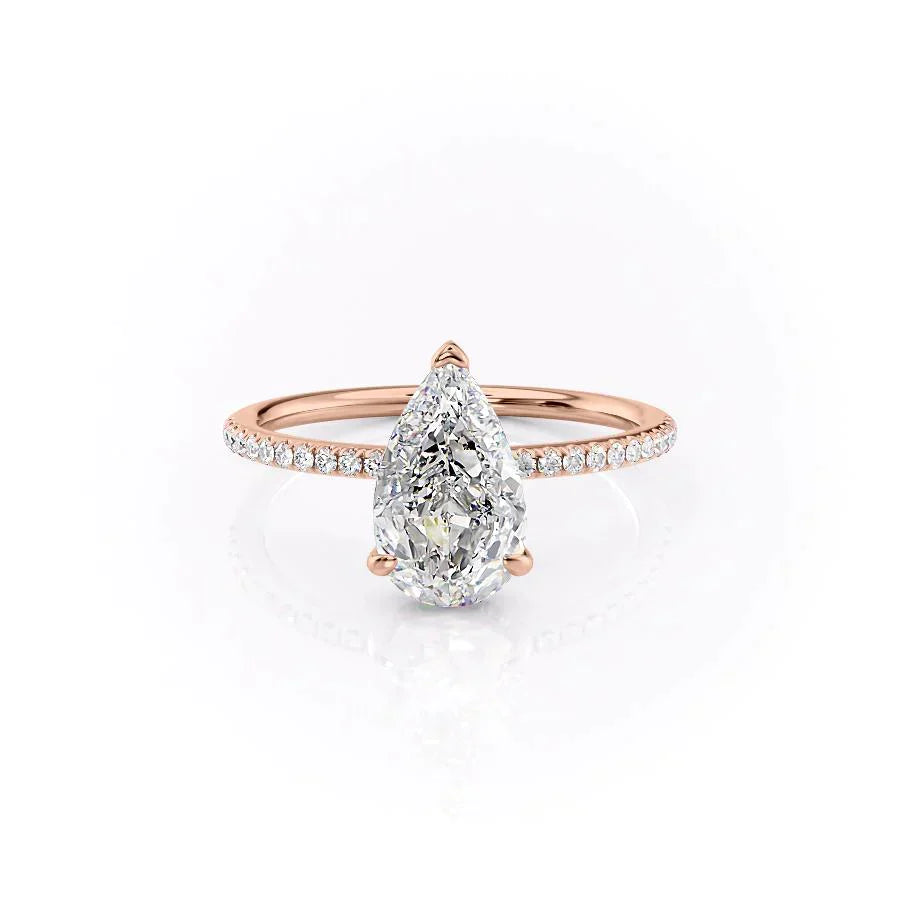 The Pave Kamellie Set With A 2.5 Carat Pear Moissanite