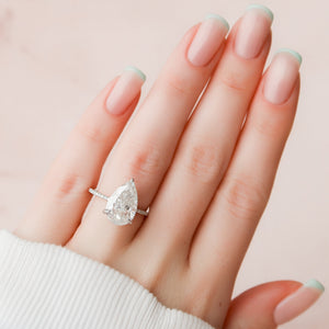 The Pave Kamellie Set With A 1.5 Carat Pear Lab Diamond