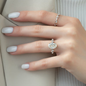 The Mia Set With A 1.5 Carat Oval Lab Diamond