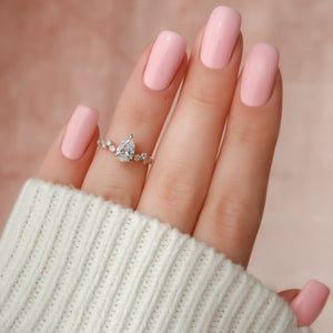 The Mia Set With A Pear Moissanite