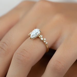 The Mia Set With A Pear Moissanite