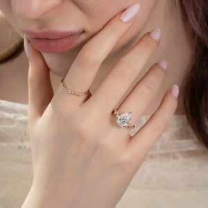 The Mia Set With A Pear Moissanite