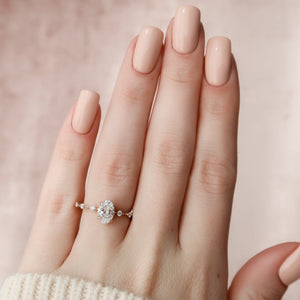 The Penelope Set With A 1.5 Carat Oval Lab Diamond