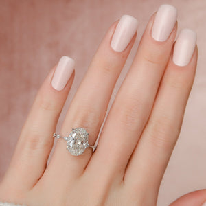 The Penelope Set With A 1.5 Carat Oval Lab Diamond