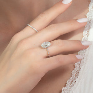 The Penelope Set With A 1.5 Carat Oval Lab Diamond