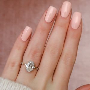 The Penelope Set With A 1 Carat Oval Lab Diamond