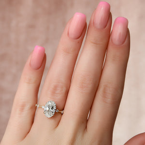 The Penelope Set With A 1 Carat Oval Lab Diamond