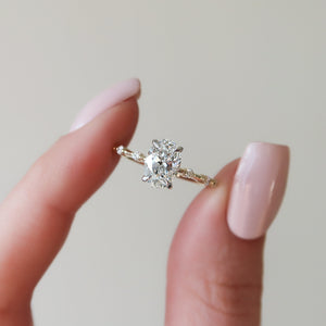 The Penelope Set With A 1 Carat Oval Lab Diamond