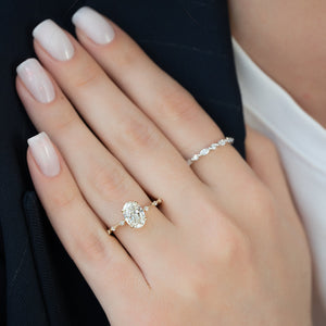 The Penelope Set With A 1 Carat Oval Lab Diamond