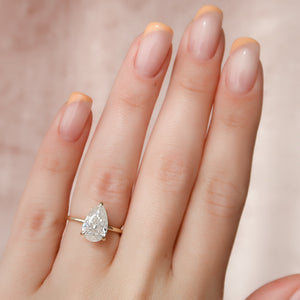 The Nelly Set With A Pear Moissanite