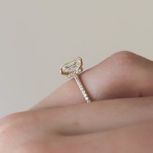 The Pave Nelly Set With A Emerald Moissanite