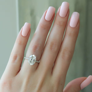 The Pave Nelly Set With A Oval Moissanite