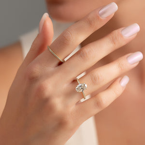 The Pave Nelly Set With A Oval Moissanite