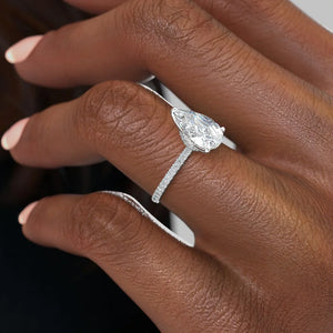 The Pave Nelly Set With A 1.5 Carat Pear Lab Diamond