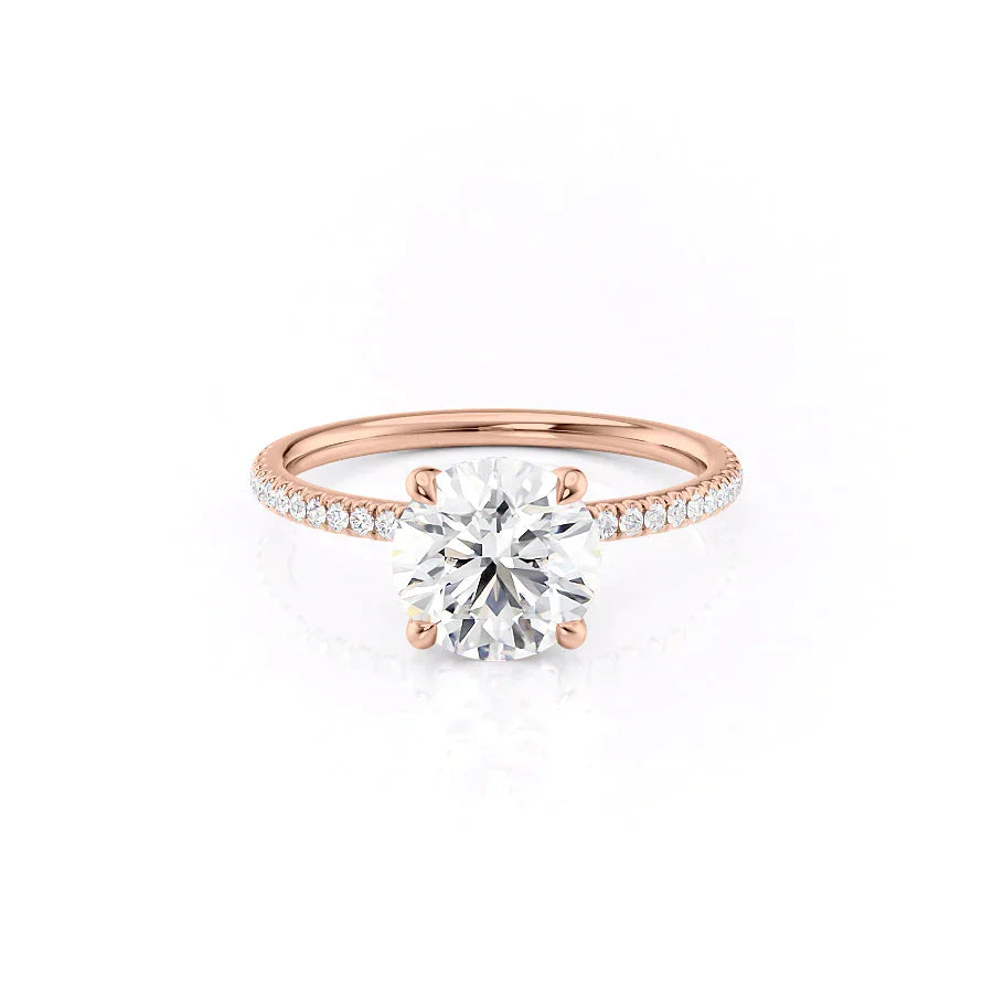 The Pave Nelly Set With A 1.5 Carat Round Moissanite