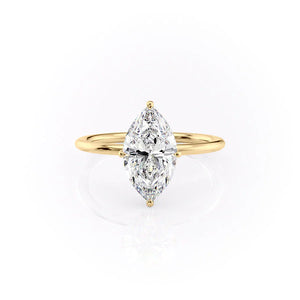 The Crown Kamellie Set With A 1.5 Carat Marquise Moissanite