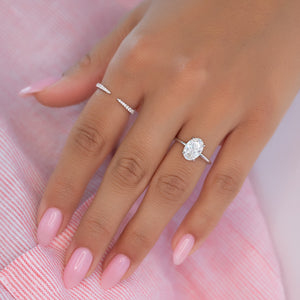 The Crown Kamellie Set With A 1.5 Carat Oval Lab Diamond