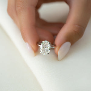 The Crown Kamellie Set With A 1.5 Carat Oval Lab Diamond