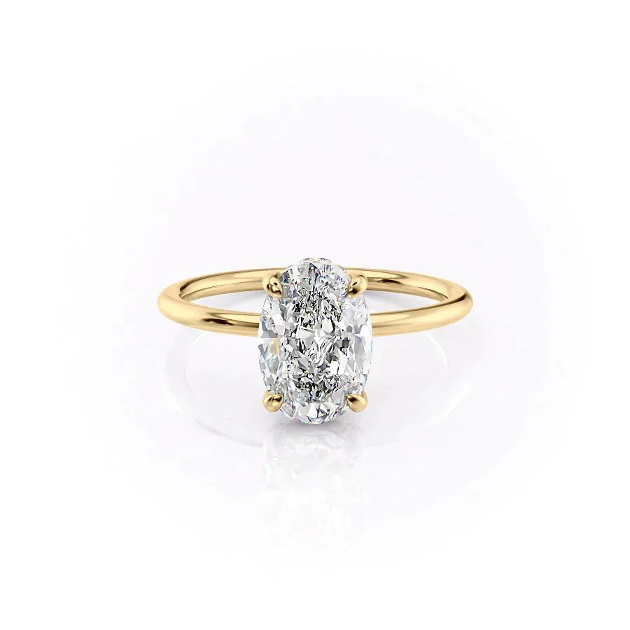 The Crown Kamellie Set With A 1.5 Carat Oval Lab Diamond