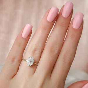 The Crown Kamellie Set With A 2 Carat Oval Lab Diamond