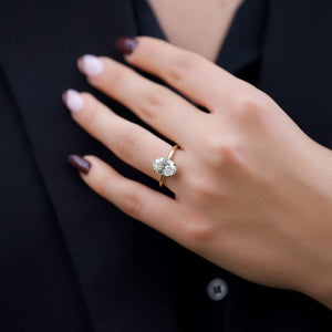 The Crown Kamellie Set With A 2 Carat Oval Lab Diamond