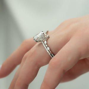 The Pave Crown Kamellie Set With A 2 Carat Elongated Cushion Moissanite