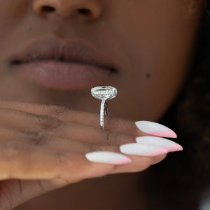The Pave Crown Kamellie Set With A 2 Carat Elongated Cushion Moissanite