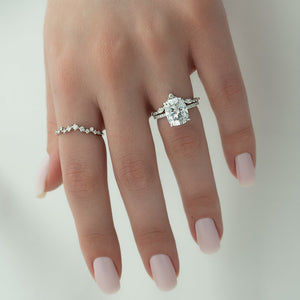 The Pave Crown Kamellie Set With A 2 Carat Elongated Cushion Moissanite