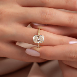 The Pave Crown Kamellie Set With A 4 Carat Elongated Cushion Moissanite