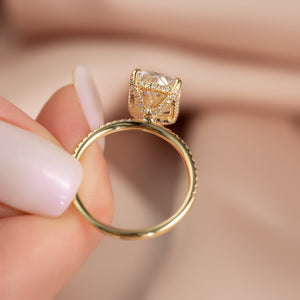The Pave Crown Kamellie Set With A 4 Carat Elongated Cushion Moissanite