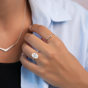 The Pave Crown Kamellie Set With A Oval Moissanite
