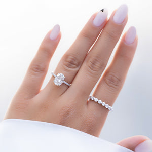 The Pave Crown Kamellie Set With A Oval Moissanite