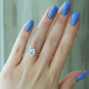 The Pave Crown Kamellie Set With A Oval Moissanite