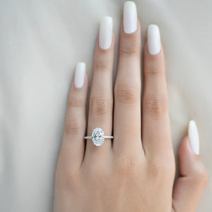 The Pave Crown Kamellie Set With A Oval Moissanite