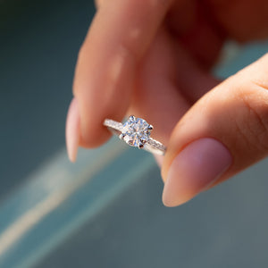 The Pave Crown Kamellie Set With A Round Moissanite