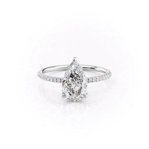 The Pave Crown Kamellie Set With A 1.5 Carat Pear Moissanite