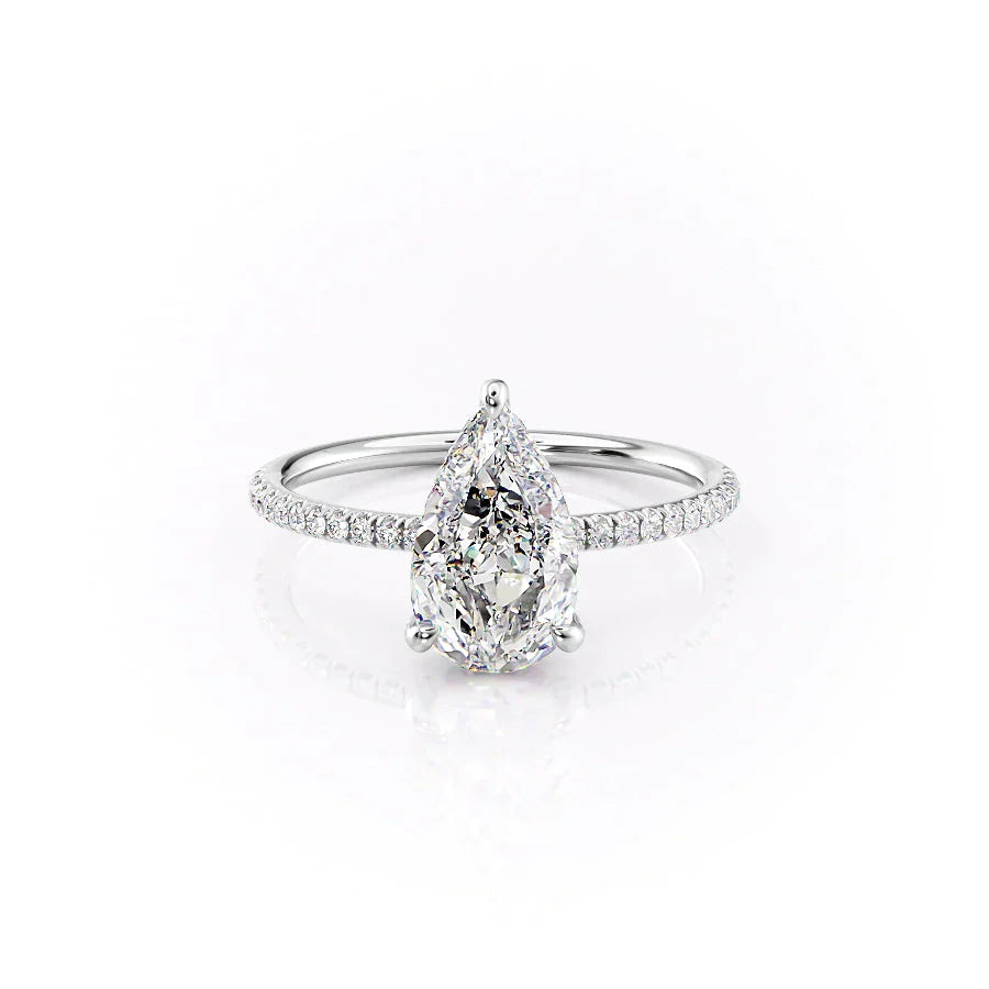 The Pave Crown Kamellie Set With A 4.5 Carat Pear Moissanite