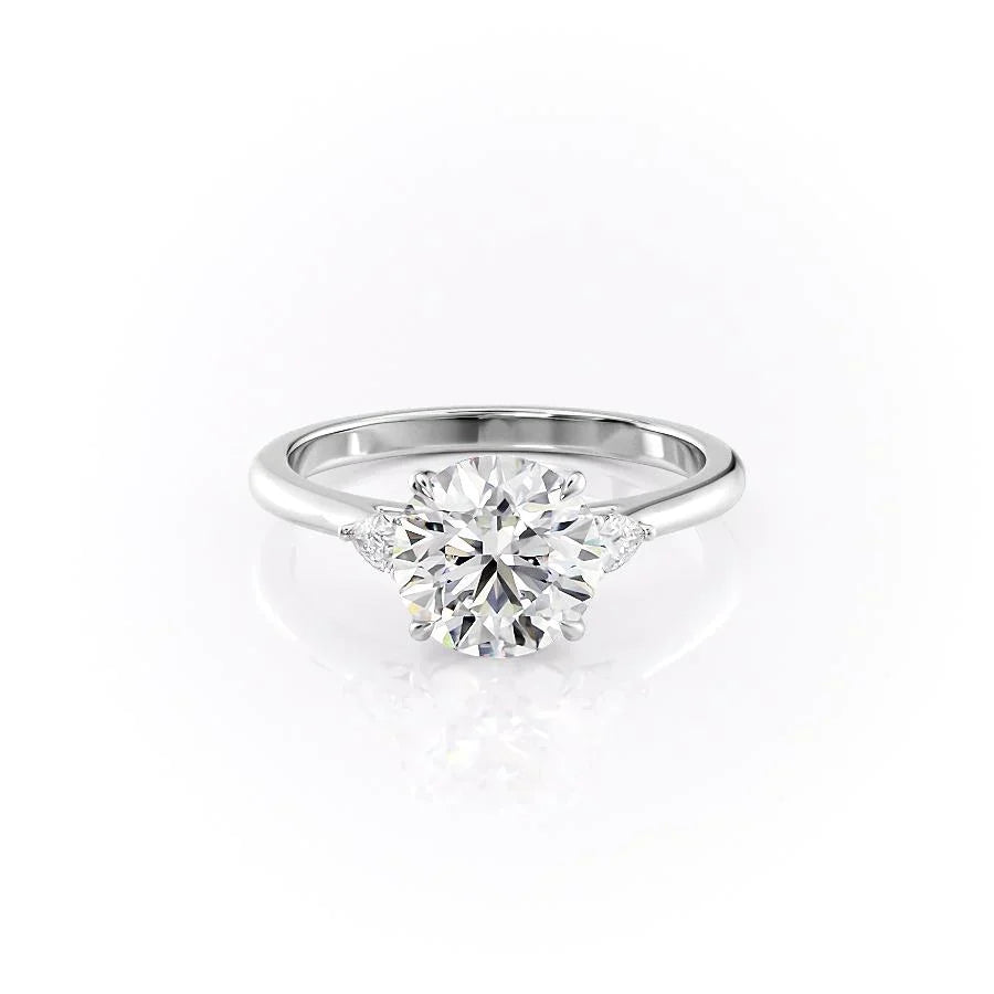 The Pears Liv Set With A Round Moissanite
