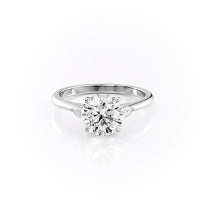 The Pears Liv Set With A Round Moissanite