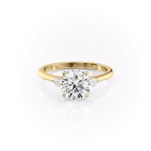 The Pears Liv Set With A Round Moissanite