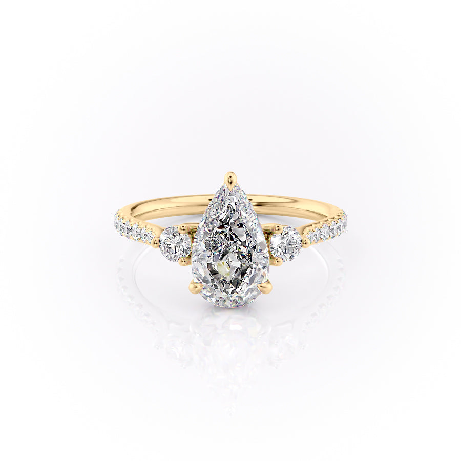 The Pave Lia Set With A 1.5 Carat Pear Moissanite
