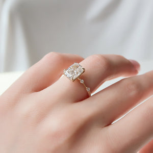 The Hidden Halo Penelope Set With A 1.5 Carat Elongated Cushion Moissanite