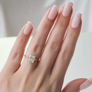 The Hidden Halo Penelope Set With A 1.5 Carat Elongated Cushion Moissanite