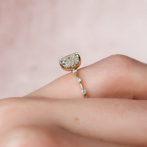 The Hidden Halo Penelope Set With A 1.5 Carat Elongated Cushion Moissanite