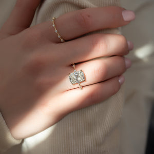 The Hidden Halo Penelope Set With A 1.5 Carat Elongated Cushion Moissanite