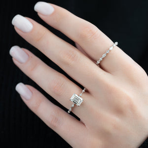 The Penelope Set With A 4.5 Carat Emerald Moissanite
