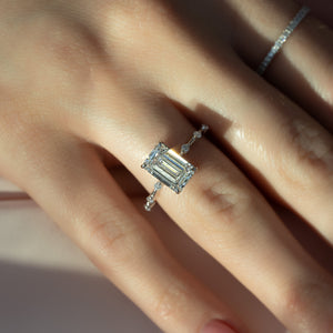 The Penelope Set With A 4.5 Carat Emerald Moissanite