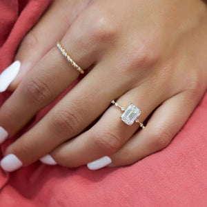 The Penelope Set With A 4.5 Carat Emerald Moissanite
